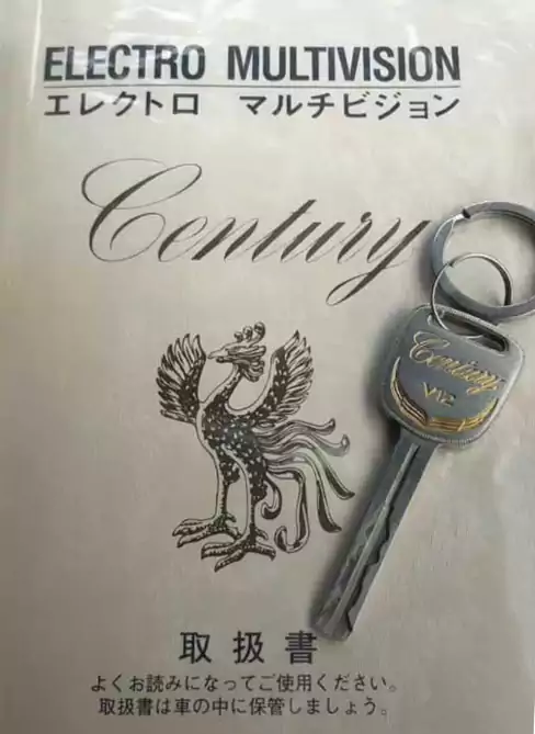 那把刻着 “Century V12” 的钥匙 在同学聚会上亮了